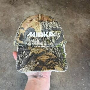 Vintage Mossy Oak camo trucker hat with adjustable snapback closure